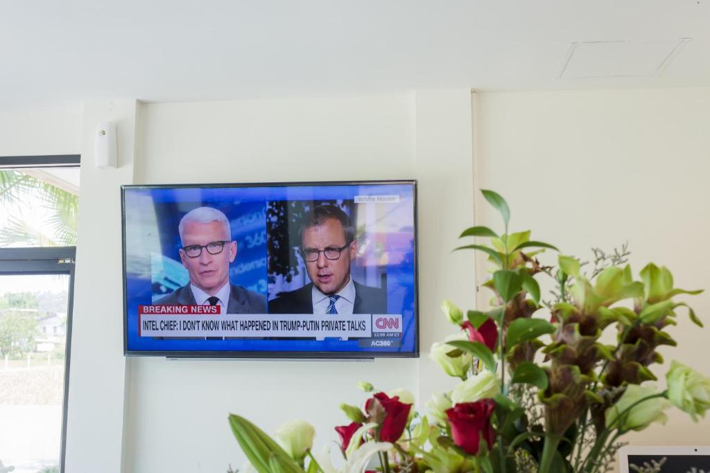 TV a/nebo společenská místnost v ubytování Journey Residence Phuket