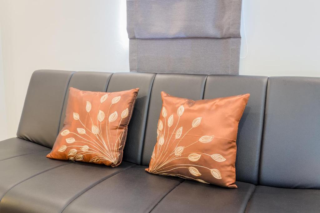 Posezení v ubytování Journey Residence Phuket