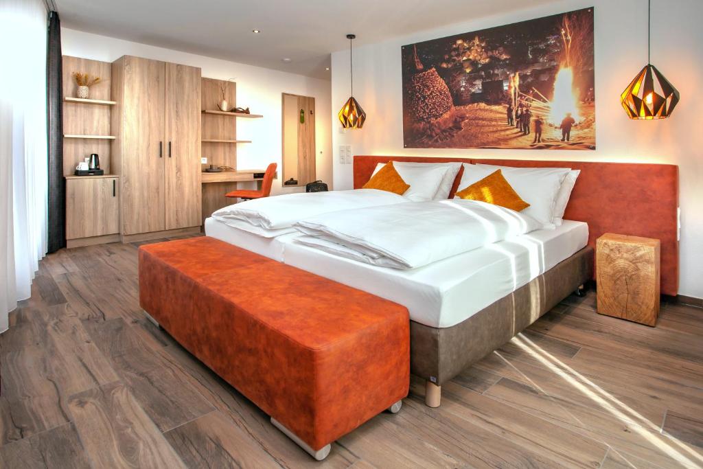 Postel nebo postele na pokoji v ubytování Rose Bistro & Gästezimmer