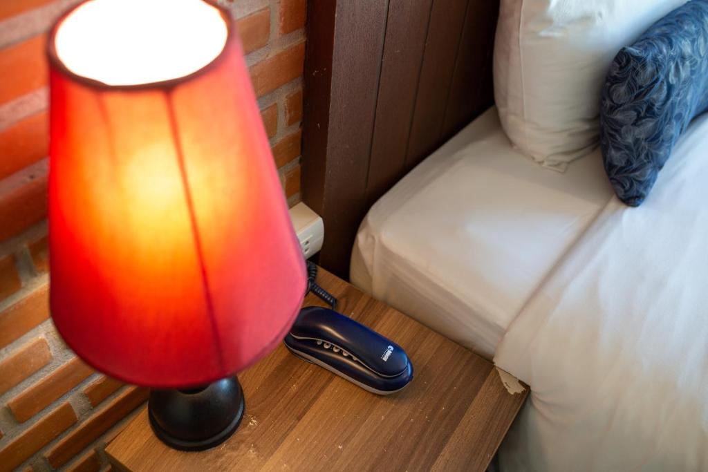 Postel nebo postele na pokoji v ubytování WE Valley Hotel