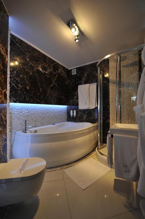 Kúpeľňa v ubytovaní Hotel Linder