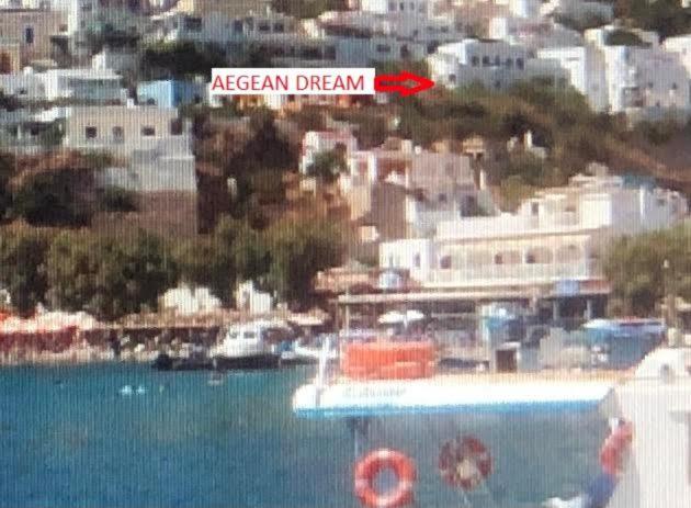 a view of a city with a red sign that says ocean dream at Aegean Dream 3 in Agia Marina
