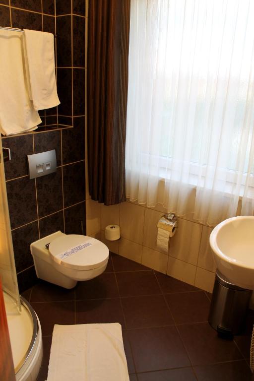 Kúpeľňa v ubytovaní Hotel Linder