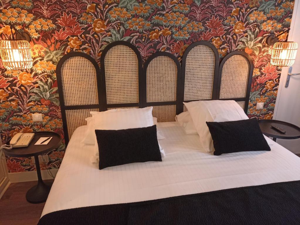Postel nebo postele na pokoji v ubytování Hotel de Champagne
