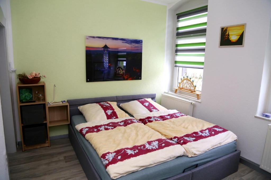 Postel nebo postele na pokoji v ubytování Gästezimmer Schmidt