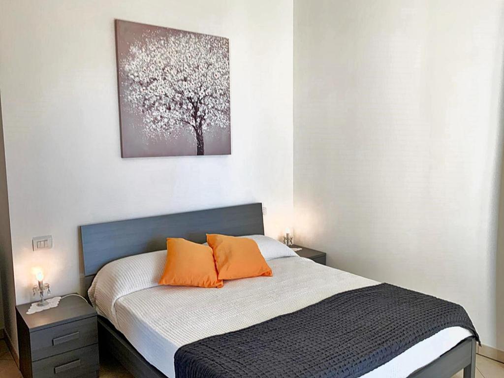 Posteľ alebo postele v izbe v ubytovaní Apartment Loretta in Villa Fiore