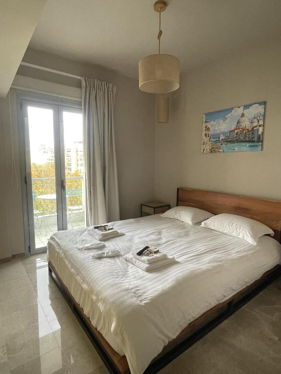Posteľ alebo postele v izbe v ubytovaní WUKELA APARTMENTS