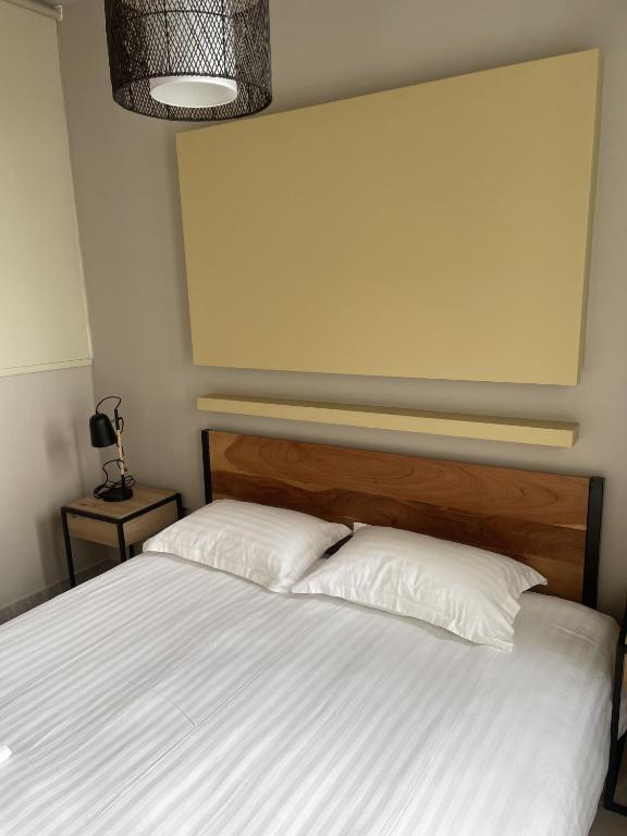 Posteľ alebo postele v izbe v ubytovaní WUKELA APARTMENTS