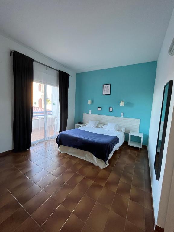 Postel nebo postele na pokoji v ubytování Hotel Plaza Miami - Sólo Adultos