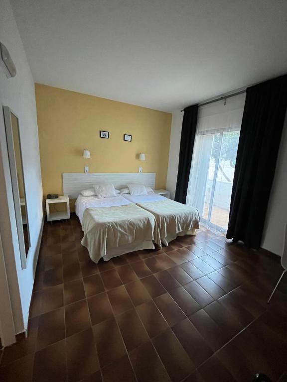 Postel nebo postele na pokoji v ubytování Hotel Plaza Miami - Sólo Adultos
