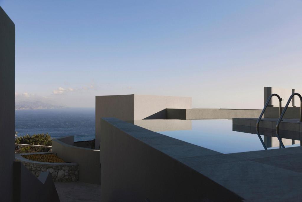 a view of a house with a swimming pool at Aposperia Memorable Living in Kyra Panagia