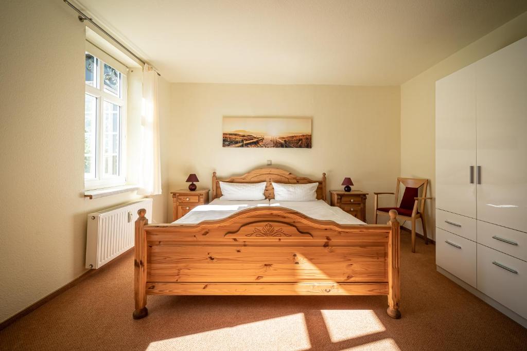 Postel nebo postele na pokoji v ubytování Murphy's Zimmer und Apartments
