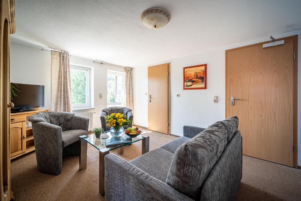 Posezení v ubytování Murphy's Zimmer und Apartments