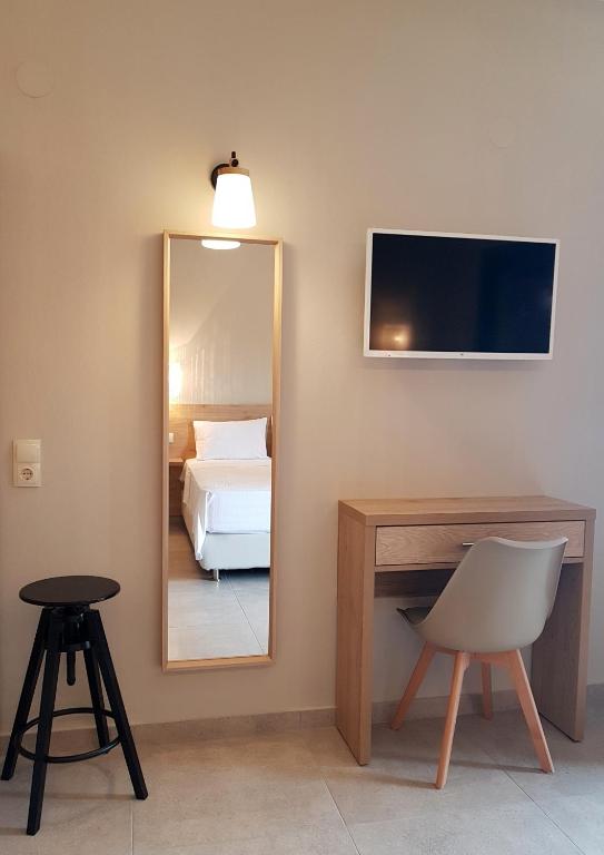 TV a/nebo společenská místnost v ubytování Annmari Studios