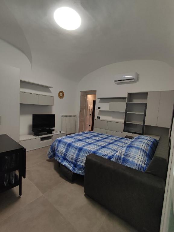 Posteľ alebo postele v izbe v ubytovaní CASA VACANZE - ANTICO CONVENTO
