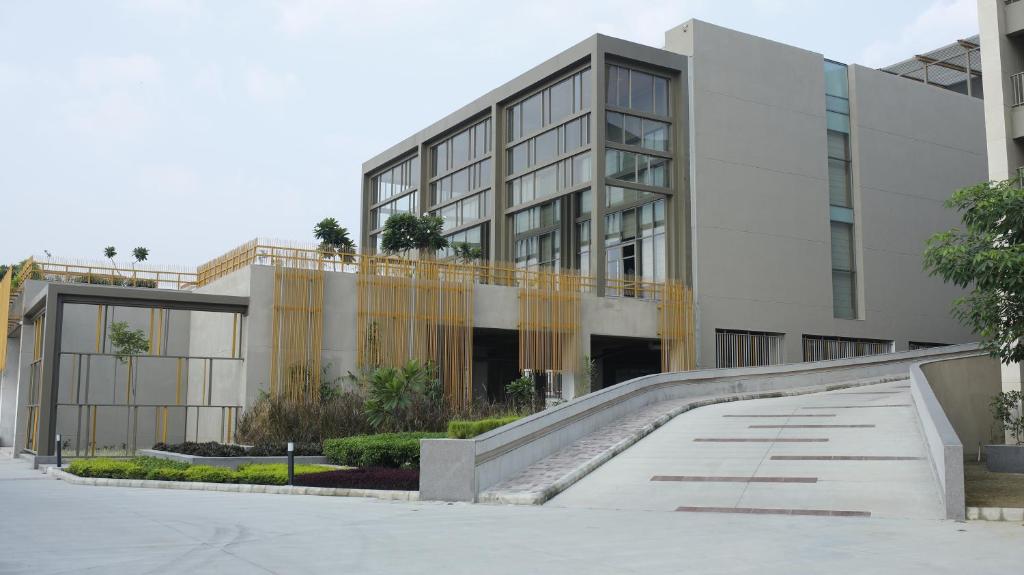 a building with a ramp in front of it at The Centrum in Lucknow