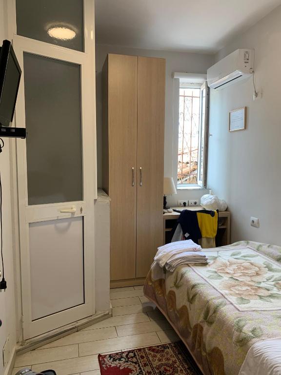 Postel nebo postele na pokoji v ubytování Guest House De Rada