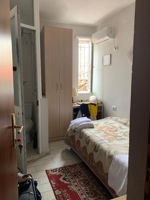Postel nebo postele na pokoji v ubytování Guest House De Rada