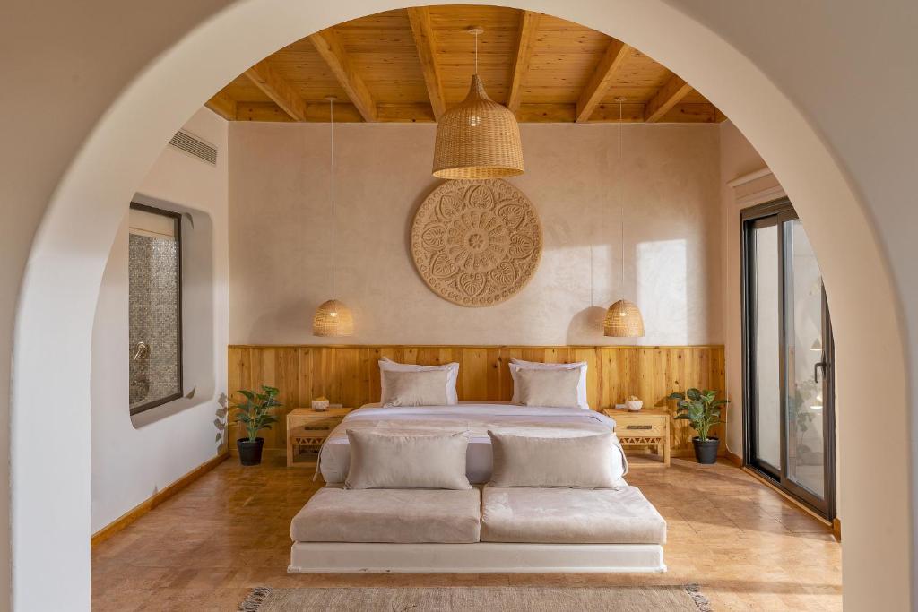 Postel nebo postele na pokoji v ubytování Benben by Dhara Hotels - Adults Only
