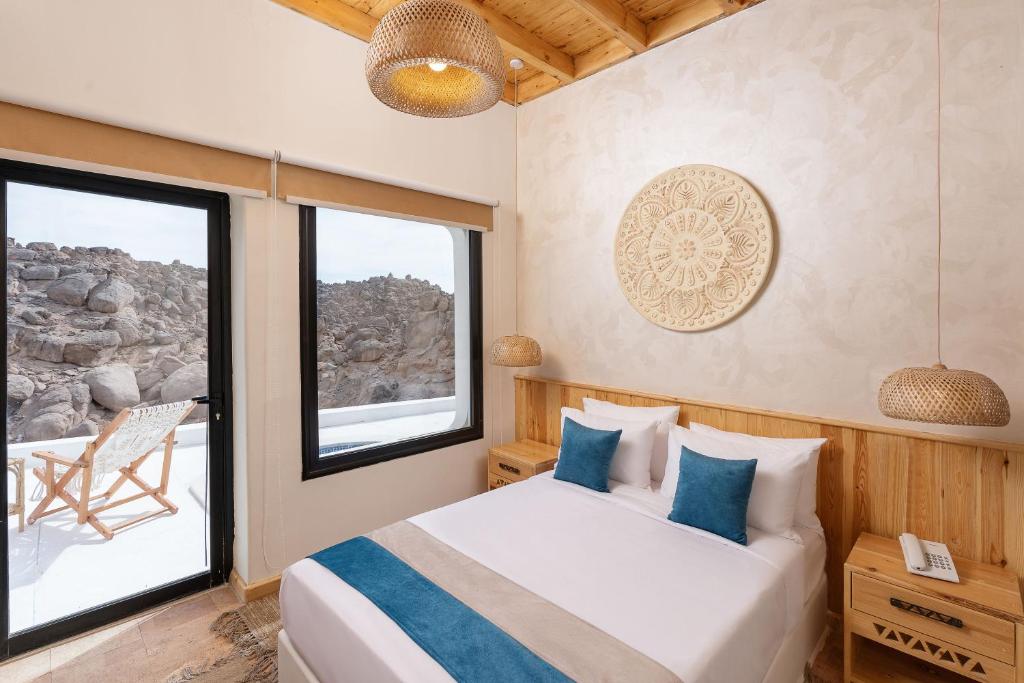 Postel nebo postele na pokoji v ubytování Benben by Dhara Hotels - Adults Only