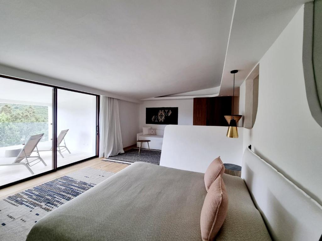 Postel nebo postele na pokoji v ubytování Hotel delle Rose a Luxury Boutique Hotel