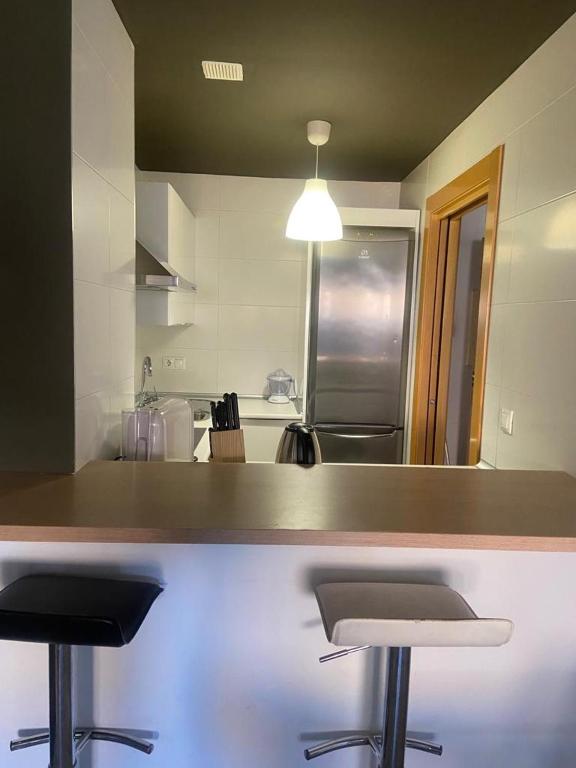 Kuchnia lub aneks kuchenny w obiekcie Apartamentos 16:9 Suites Almería