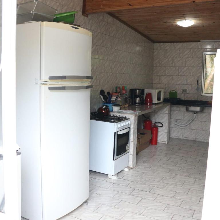 Kuchyň nebo kuchyňský kout v ubytování Pousada do Carlito