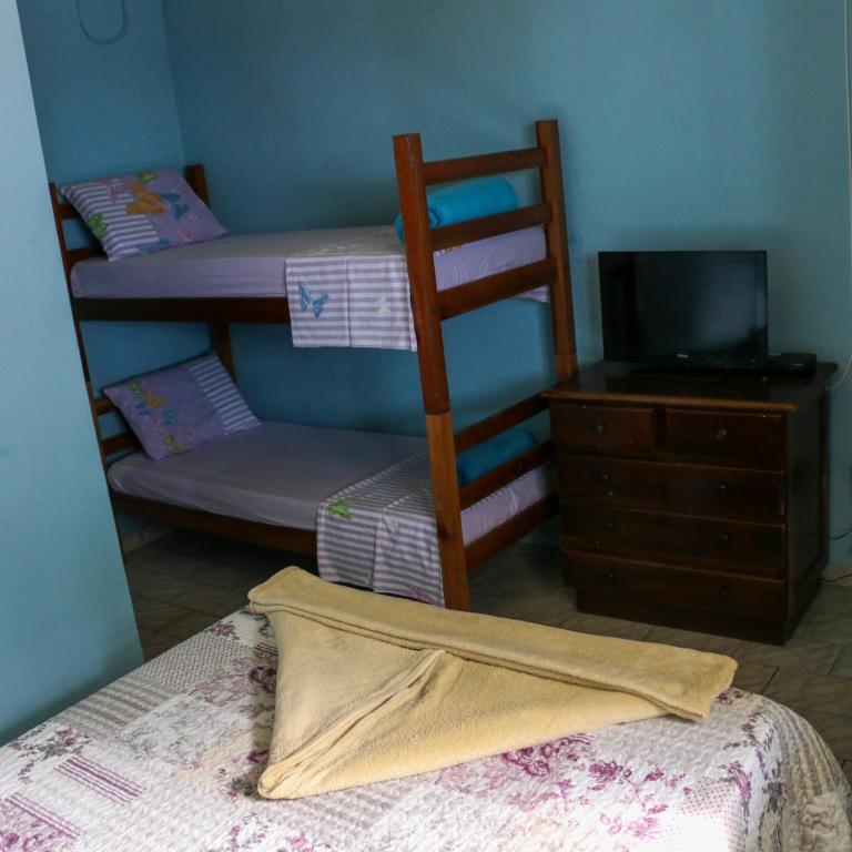 Postel nebo postele na pokoji v ubytování Pousada do Carlito