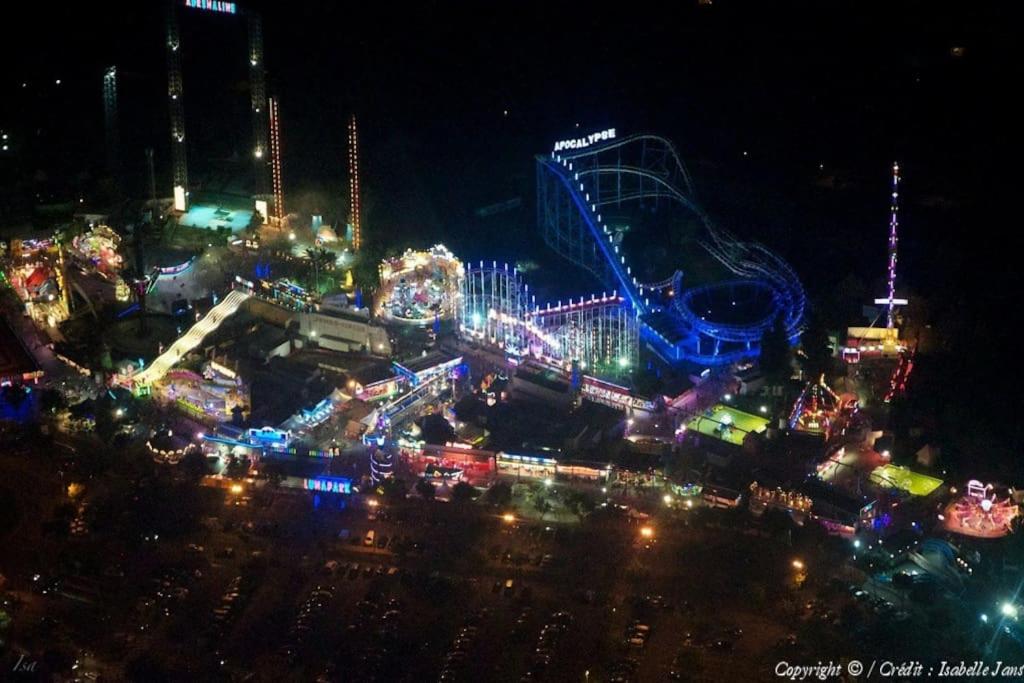 an amusement park at night with a roller coaster at CAP D&#39;AGDE studio cabine 6 pers. + terrasse + parking privé + clim (calme) in Cap d&#39;Agde