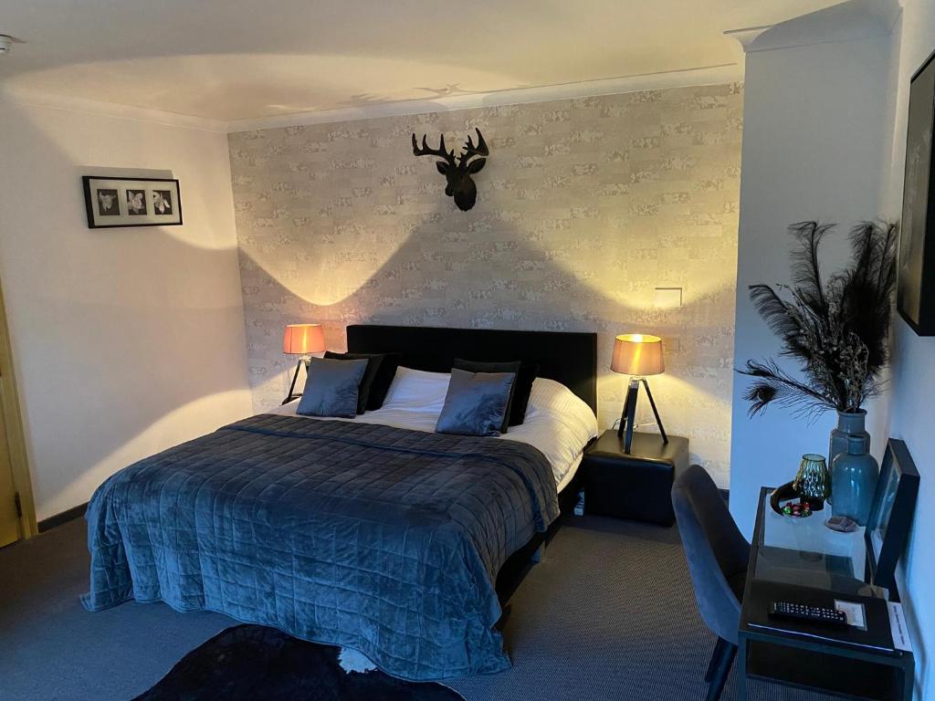 Postel nebo postele na pokoji v ubytování Hotel Ten Lande