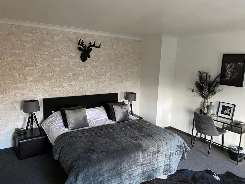 Postel nebo postele na pokoji v ubytování Hotel Ten Lande