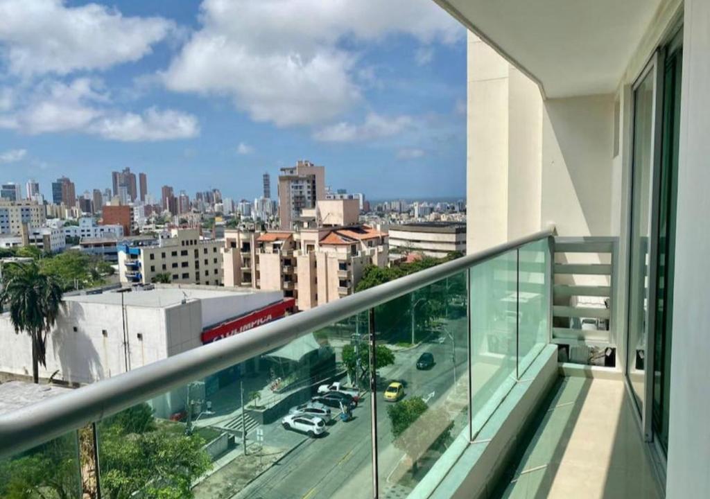 a balcony with a view of a city at Apartamento en Sector Ciudad Jardin Barranquilla cerca al Centro Comercial Unico in Barranquilla
