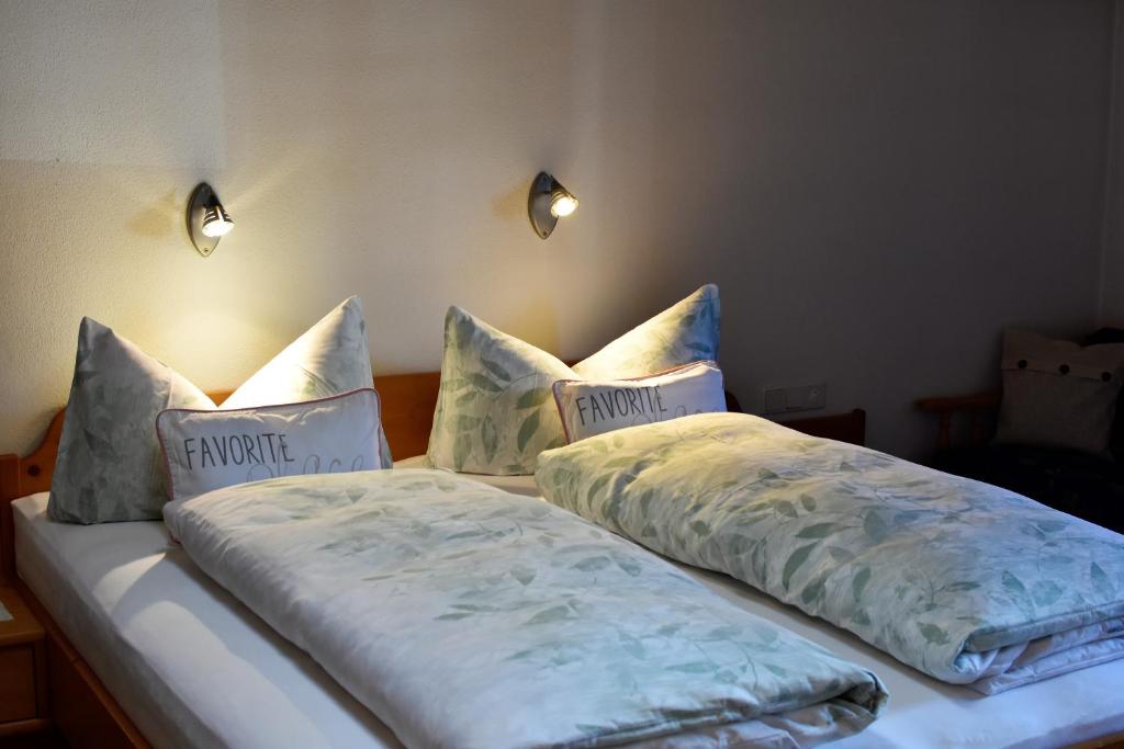 Postel nebo postele na pokoji v ubytování Haus Waldner