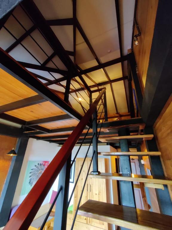 Palanda nebo palandy na pokoji v ubytování Amansara Bungalow