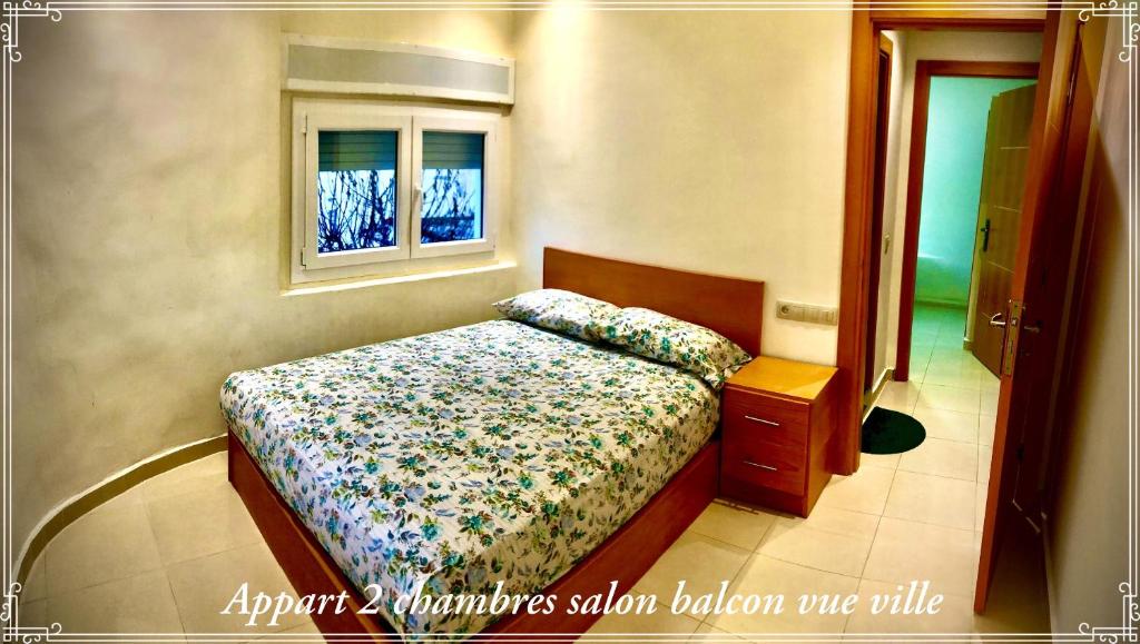 Een bed of bedden in een kamer bij Hôtel Réstinga Martil
