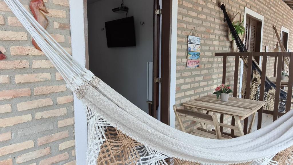 TV a/nebo společenská místnost v ubytování Pousada Brilho da Lua