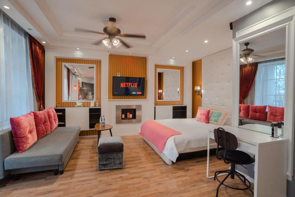 Postel nebo postele na pokoji v ubytování Alpetri Apartments