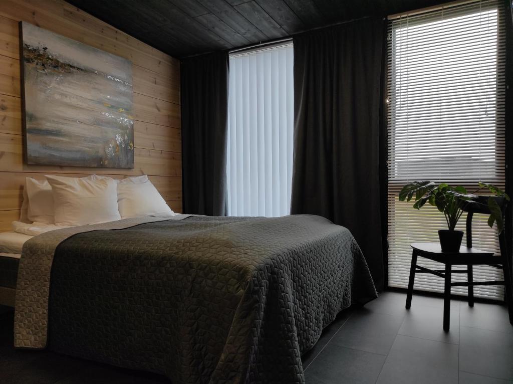 Postel nebo postele na pokoji v ubytování Black Hotel