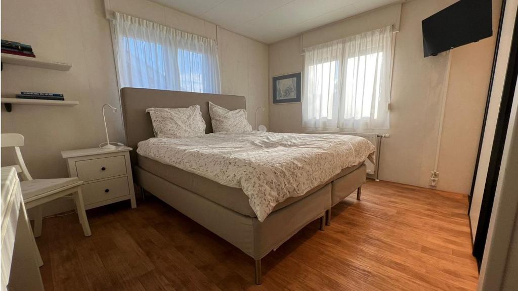 Postel nebo postele na pokoji v ubytování Chalet Buutengeweun, met luxe JACUZZI en TONSAUNA