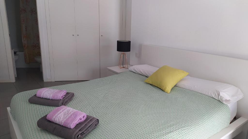 A bed or beds in a room at Casa Rincón Medanero