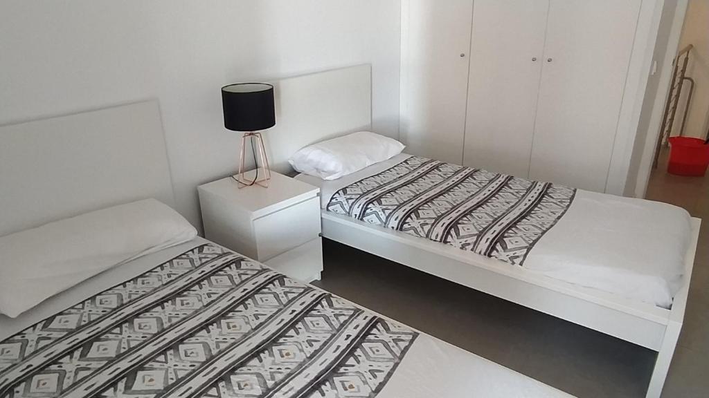 A bed or beds in a room at Casa Rincón Medanero