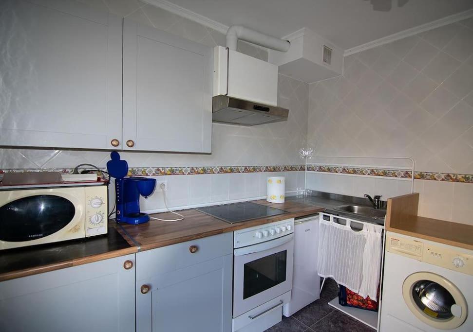 Kuchyň nebo kuchyňský kout v ubytování Villa Miguel