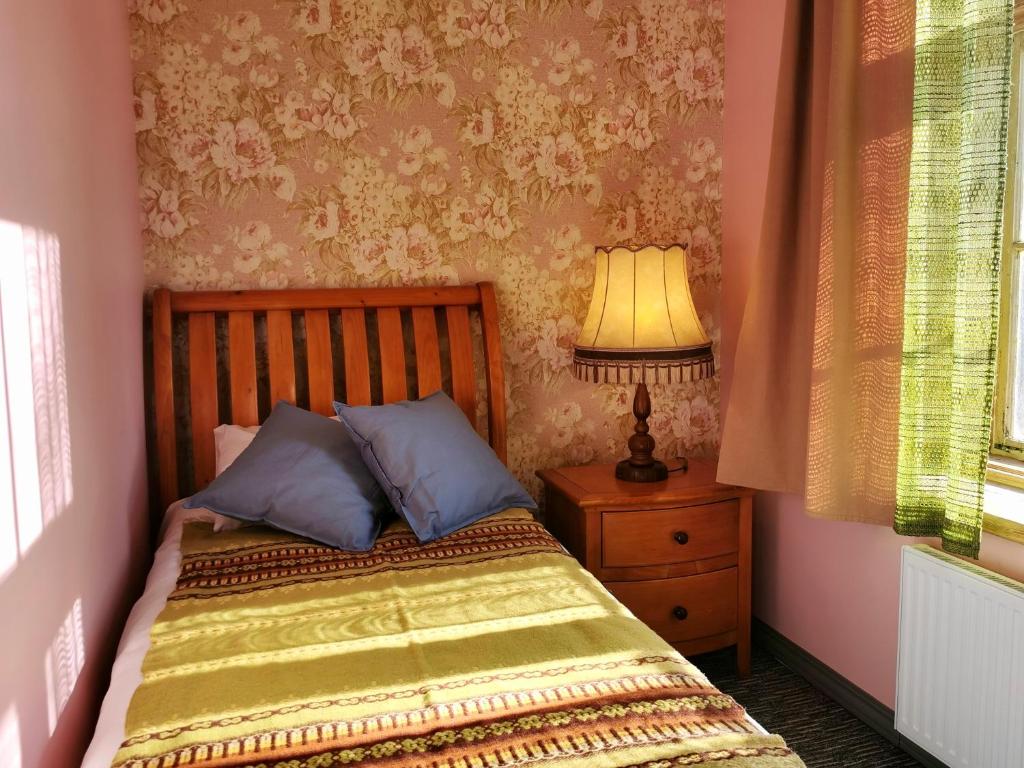 Postel nebo postele na pokoji v ubytování Lielbornes Muiža Boutique Hotel&Recreation Complex