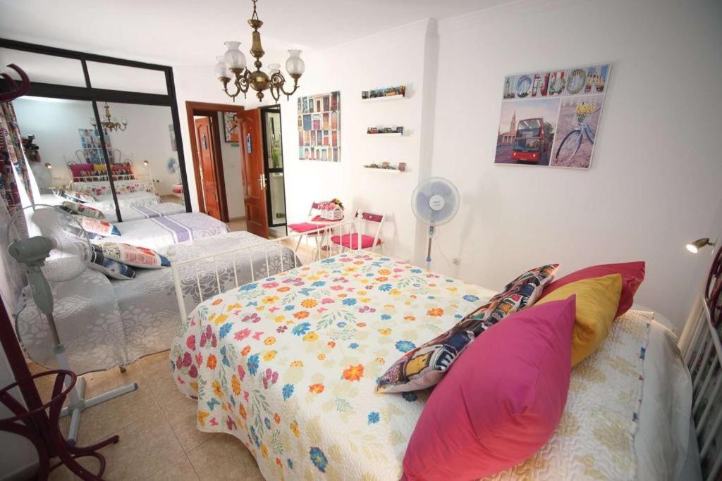 Postel nebo postele na pokoji v ubytování La Casa de La Abuela Rosy