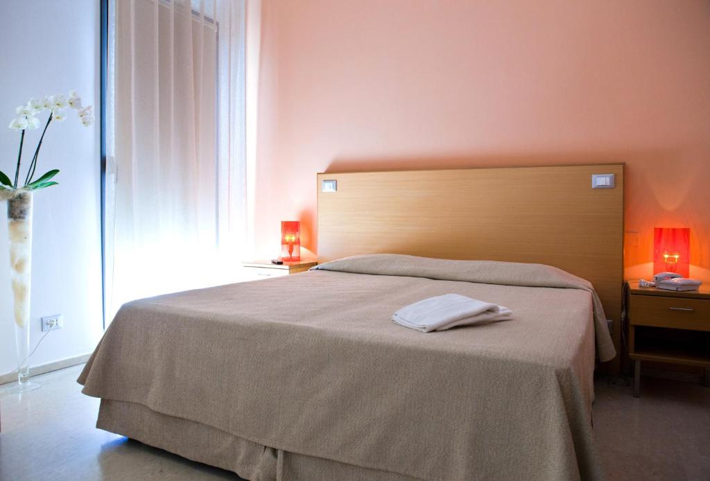Postel nebo postele na pokoji v ubytování Le Saline Hotel