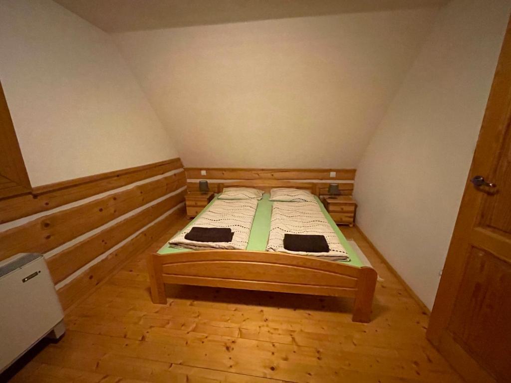 Postel nebo postele na pokoji v ubytování Nasa Chata