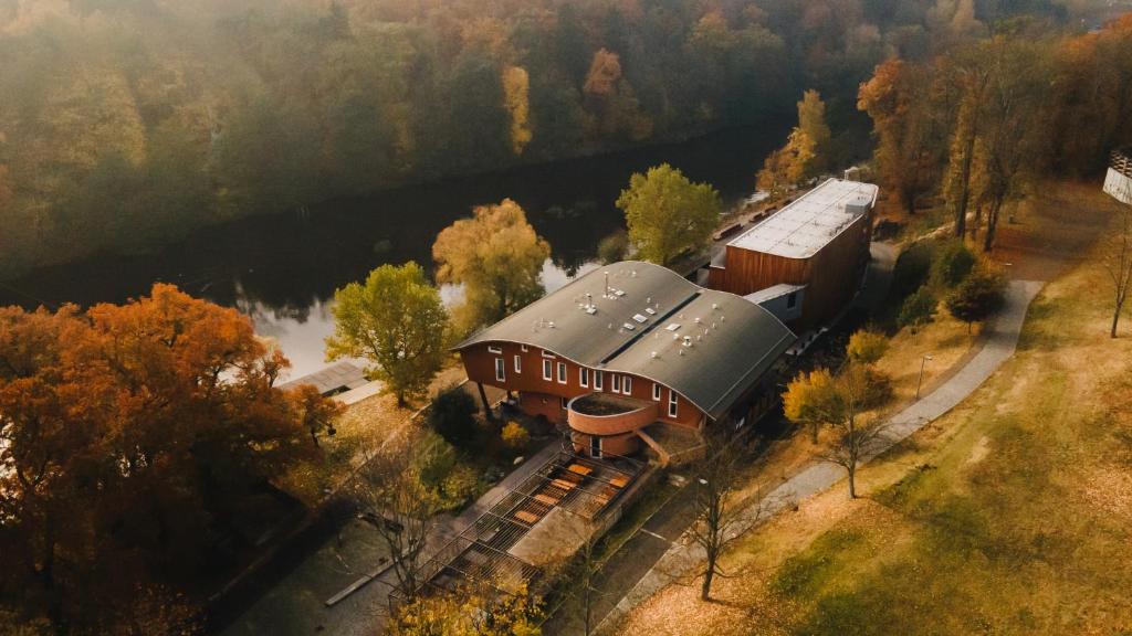 an aerial view of a building with a train at Hotel Split in Kadaň