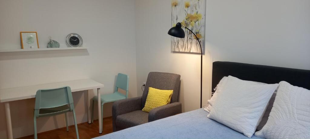 Posteľ alebo postele v izbe v ubytovaní Apartment Zsa Zsa Zenta 1