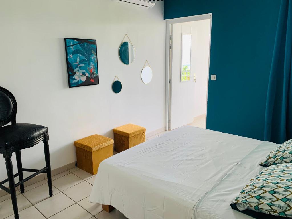 Postel nebo postele na pokoji v ubytování Villa Fresh&Cosy Trois-Ilets 3 étoiles