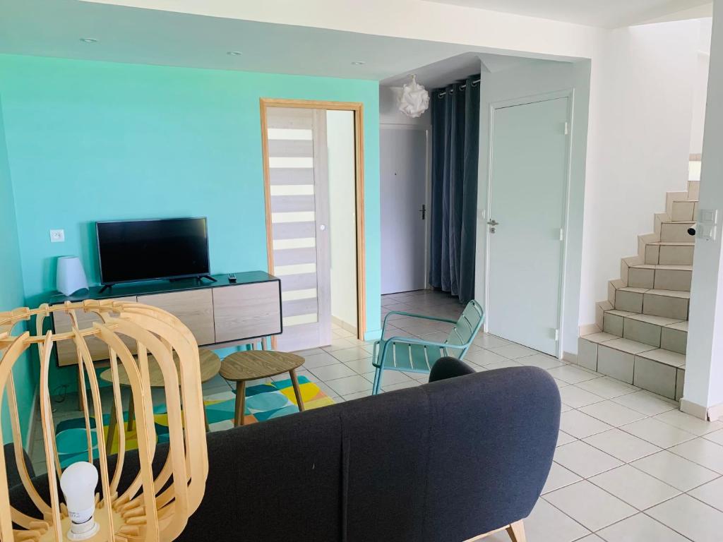 TV a/nebo společenská místnost v ubytování Villa Fresh&Cosy Trois-Ilets 3 étoiles